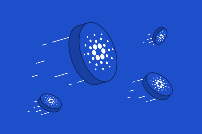 Several Cardano coins flying through the air with a blue background