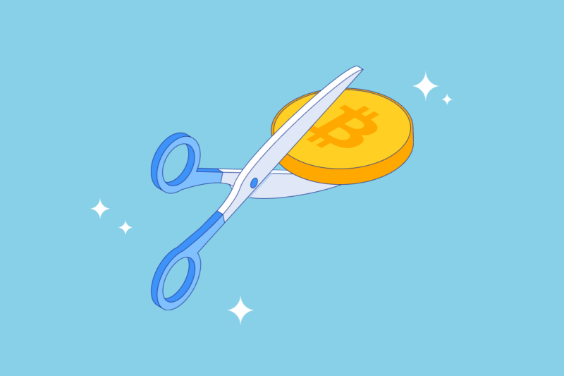 Illustration of a pair fo scissors cutting through a Bitcoin