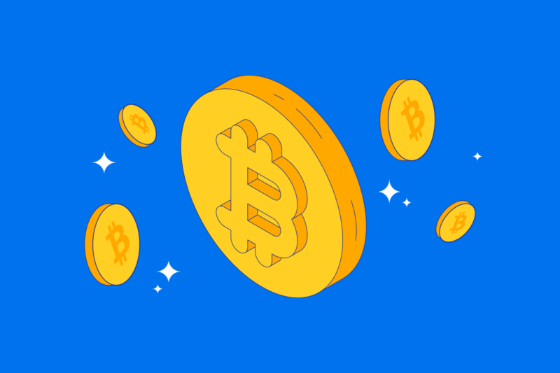 Several Bitcoins in front of bright blue background