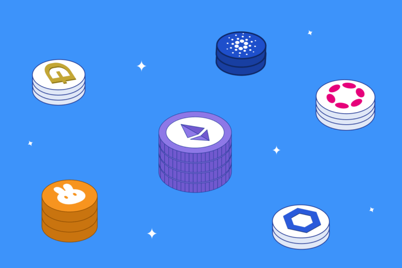 several different altcoins piled up in front of blue background